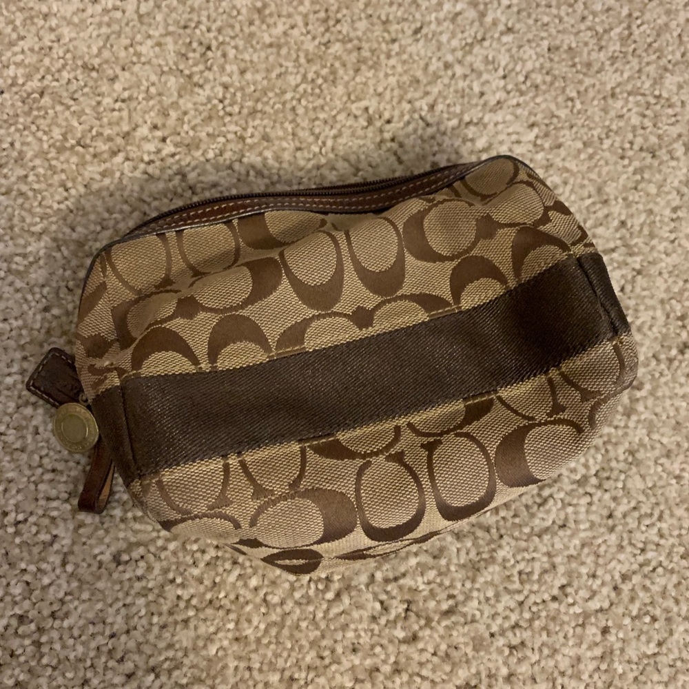 Brown Coach makeup bag